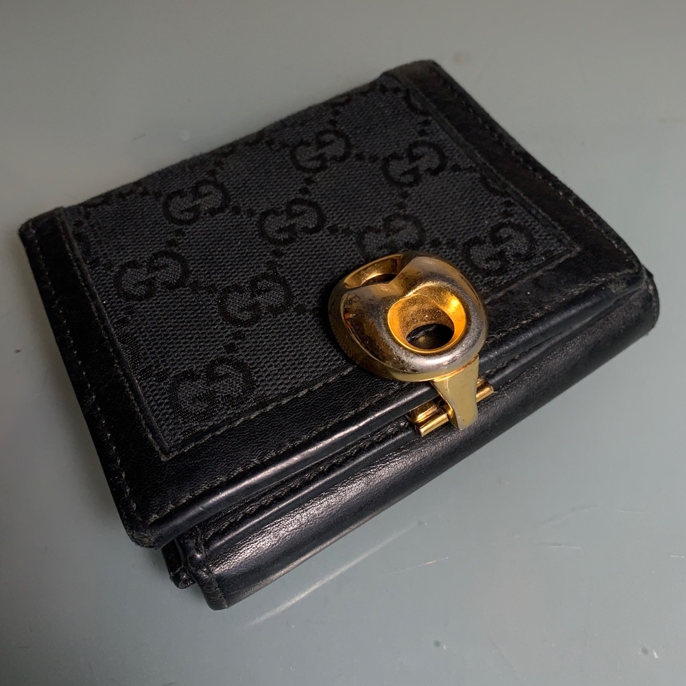 GUCCI trifold Monogram leather wallet